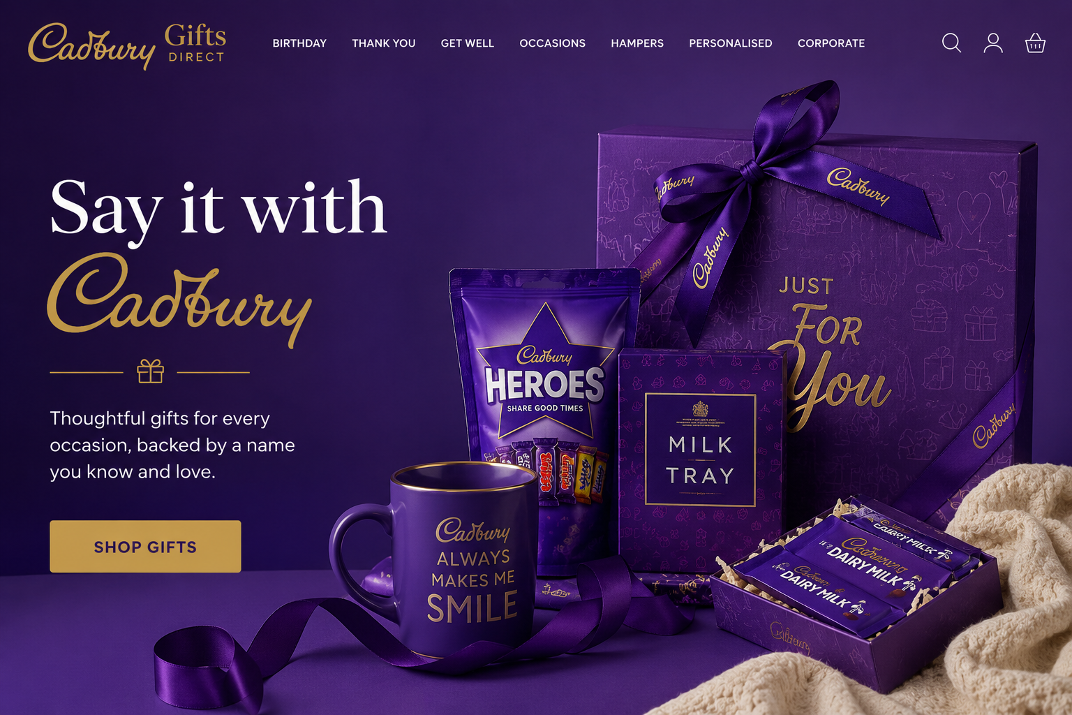 Cadbury Gifts Direct display featuring personalized chocolate bars, gift hampers, and assorted Cadbury treats for gifting occasions.